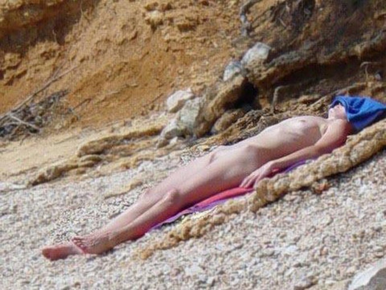 Beach picture topless wet woman